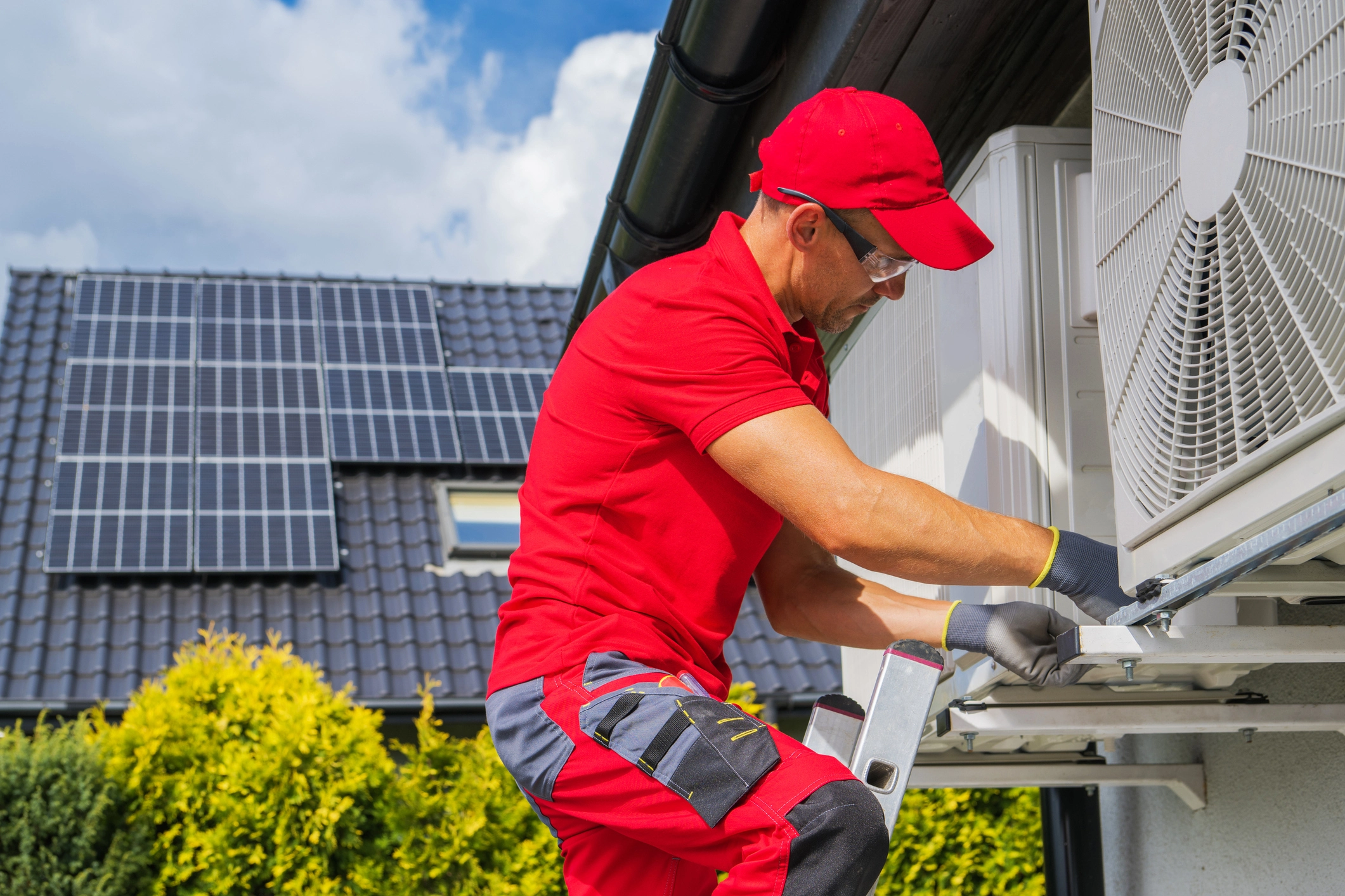 A professional technician installing a Heat Pump