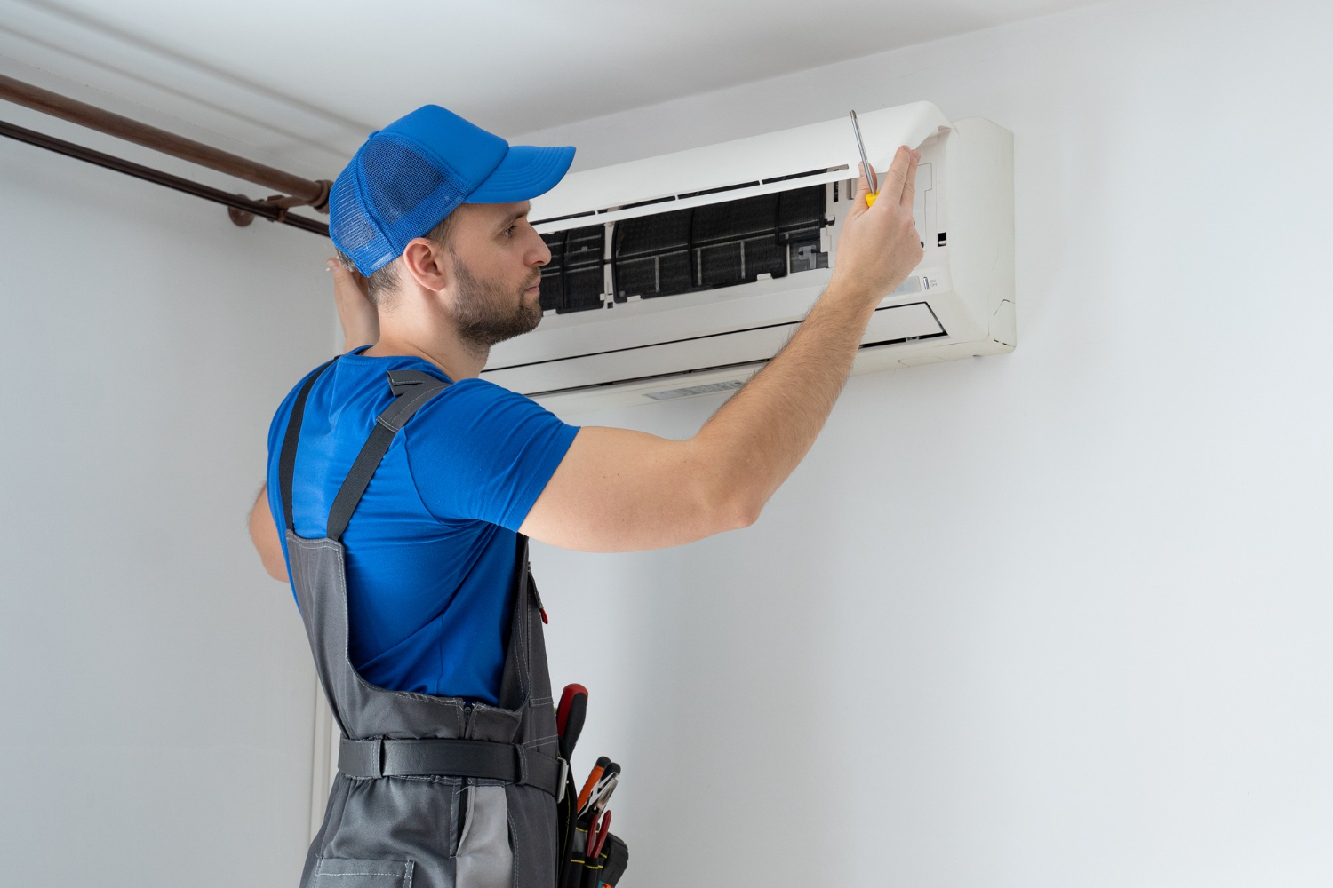 professional technician installing a new AC unit